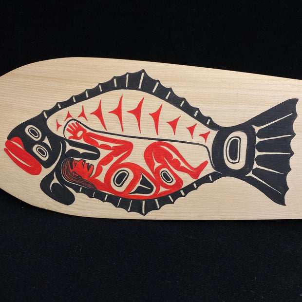 Halibut Man with Wolf Halibut Hook Paddle by Ken Decker