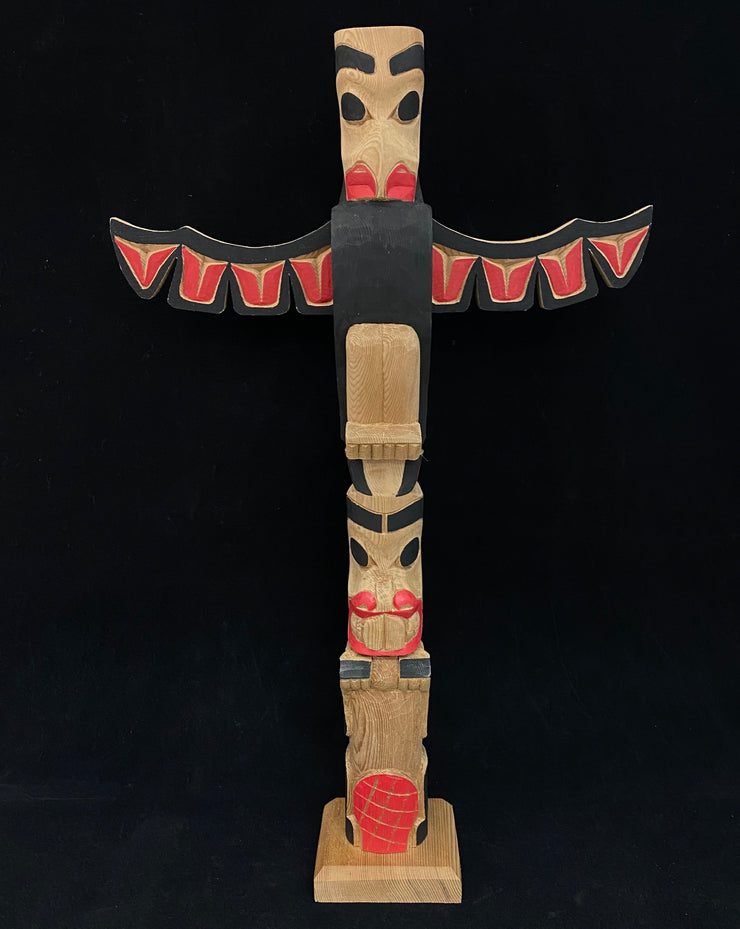 Eagle/Beaver Totem Pole with wings by Norman Natkong Jr.